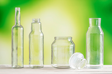 Image showing Empty glass bottles on a table