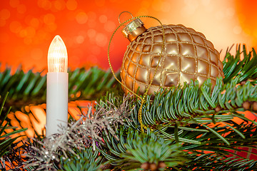 Image showing Christmas lights with a golden bauble