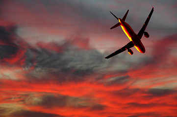 Image showing Air travel - plane and sunset