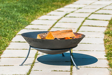 Image showing Outdoor fireplace in a garden