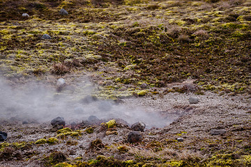 Image showing Steamy smoke on a lava field