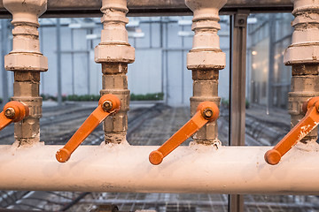 Image showing Factory pipes with handles