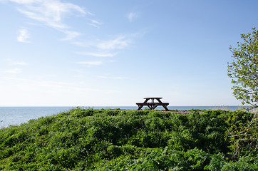 Image showing Bench and table at seaside