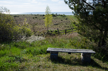 Image showing Wooden bench at a view point