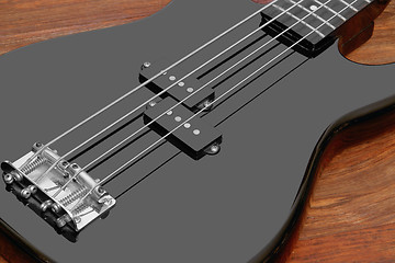 Image showing black bass guitar detail