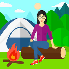 Image showing Woman sitting at camp.