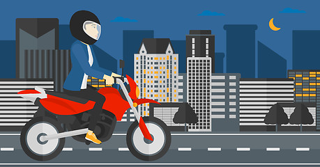 Image showing Woman riding motorcycle.