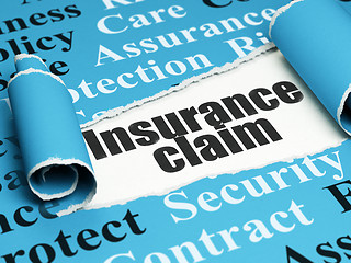 Image showing Insurance concept: black text Insurance Claim under the piece of  torn paper