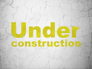 Image showing Web development concept: Under Construction on wall background