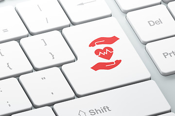 Image showing Insurance concept: Heart And Palm on computer keyboard background