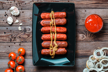 Image showing Sausage roasted on the grill.