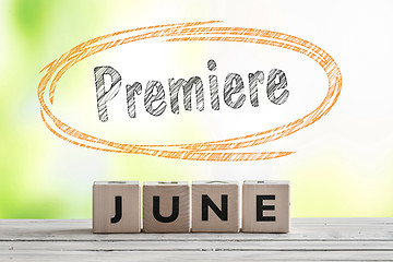 Image showing June premiere sign on a wooden stage