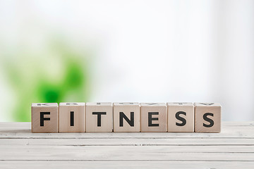 Image showing Fitness word on a wooden table