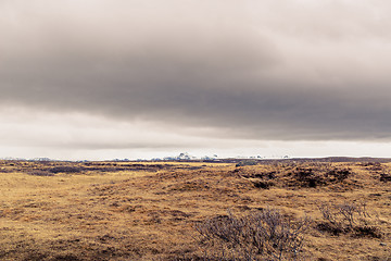 Image showing Dark clouds over a landscape in Iceland