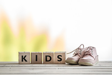 Image showing Kids sign and cute shoes