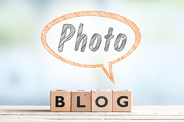 Image showing Photography blogger sign on a table