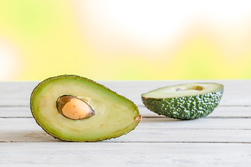 Image showing Avocado in half on a table