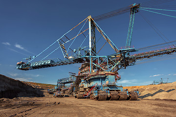 Image showing Large excavator machine in the mine