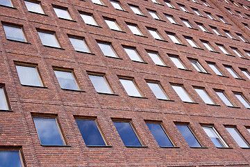 Image showing Front of a Brick building and a nice blue sky