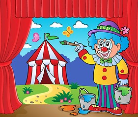 Image showing Clown painting image of circus on stage