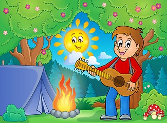 Image showing Boy guitar player in campsite theme 1