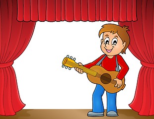 Image showing Boy guitar player on stage theme 1
