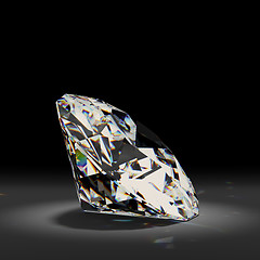 Image showing Shiny white diamond on black background. 