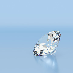 Image showing Shiny white diamond on blue background. 