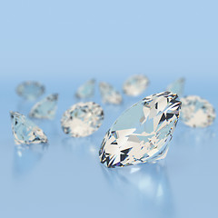 Image showing Shiny white diamonds on blue background. 