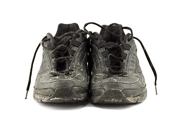 Image showing Old grungy Running Shoes isolated on white background