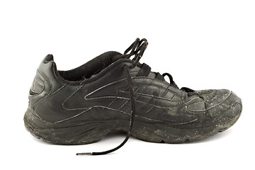 Image showing Old grungy Running Shoes isolated on white background