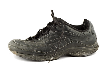 Image showing Old grungy Running Shoes isolated on white background