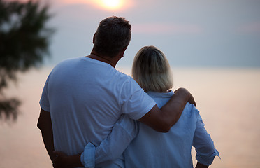 Image showing Romantic couple enjoying the sunset