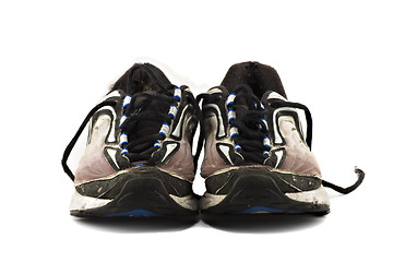 Image showing Old grungy Running Shoes isolated on white background