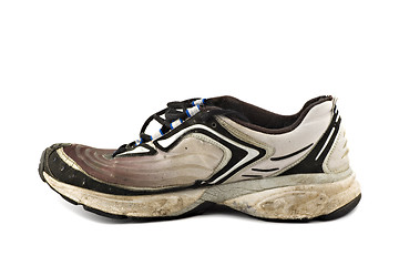 Image showing Old grungy Running Shoes isolated on white background