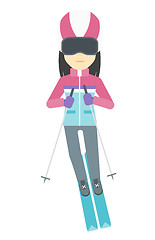 Image showing Young woman skiing.