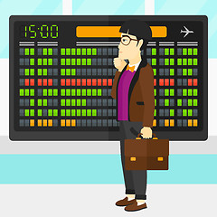 Image showing Man looking at schedule board.