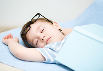 Image showing Cute little boy is sleeping