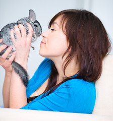 Image showing Woman with chinchilla