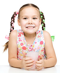 Image showing Cute little girl showing milk moustache