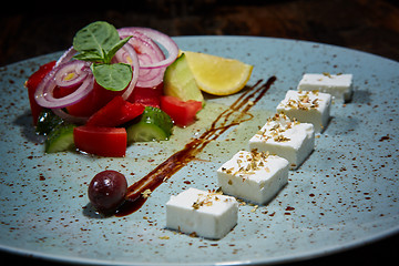 Image showing Fresh Greek salad in a bowl,