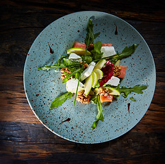 Image showing Homemade salad with apple and salmon