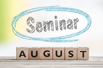 Image showing August seminar sign on a scene
