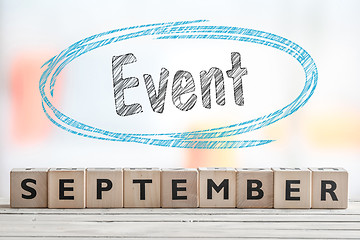 Image showing September event sign with blue sketch