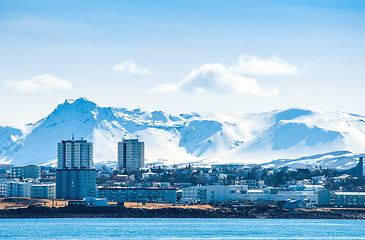 Image showing Reykjavik city in Ieland beneath a mountain