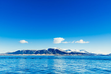 Image showing Blue ocean with distant mountains