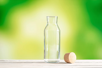 Image showing Empty glass bottle with a cork