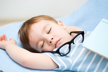 Image showing Cute little boy is sleeping