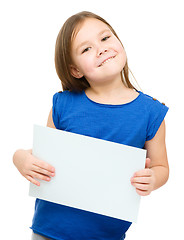 Image showing Little girl is holding blank banner