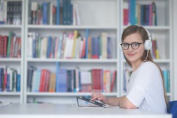 Image showing female student study in library